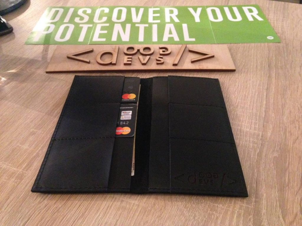 branded wallet and wooden sign